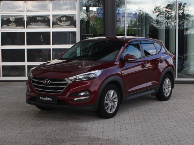 Hyundai Tucson красный,  2.0 AT (150 л.с.) 4WD