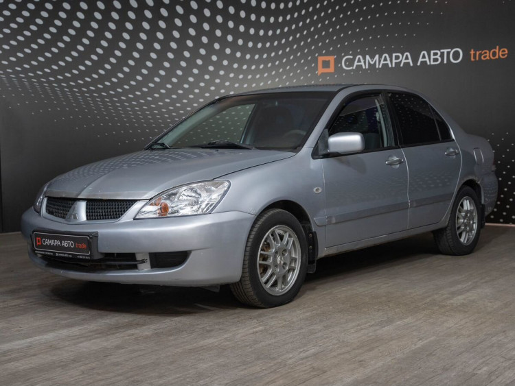 Mitsubishi Lancer серебряный,  1.6 MT (98 л.с.)