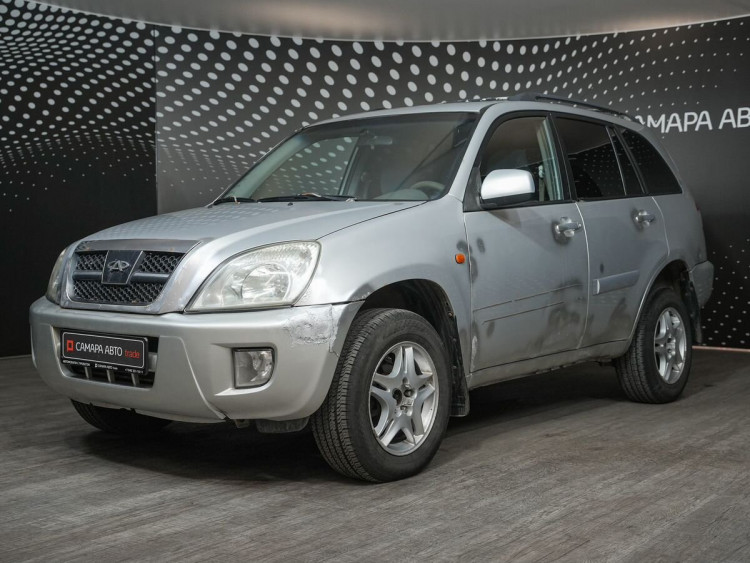 Chery Tiggo серебряный,  2.4 MT (129 л.с.)