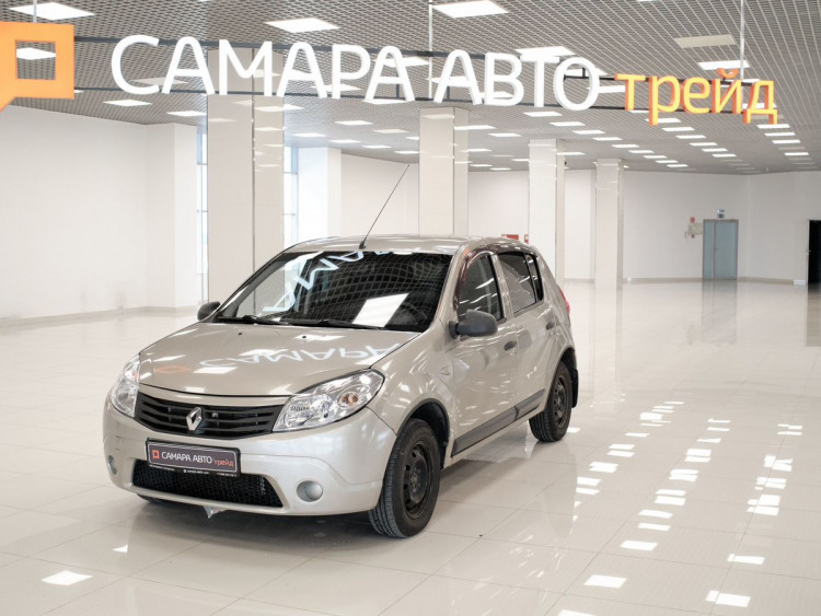 Renault Sandero Expression beige,  1.4 MT (75 л.с.)