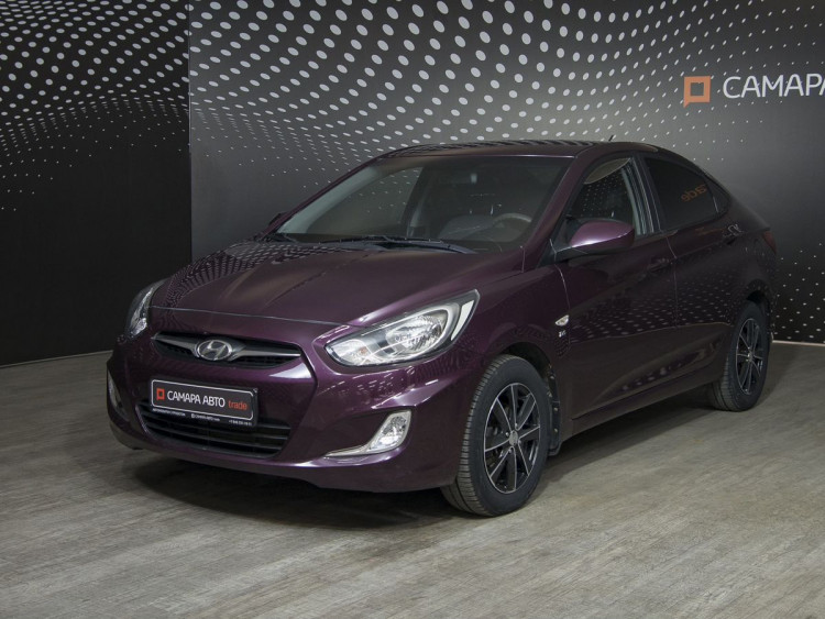 Hyundai Solaris фиолетовый,  1.6 MT (123 л.с.)