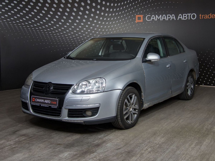 Volkswagen Jetta серый,  1.4 AMT (122 л.с.)