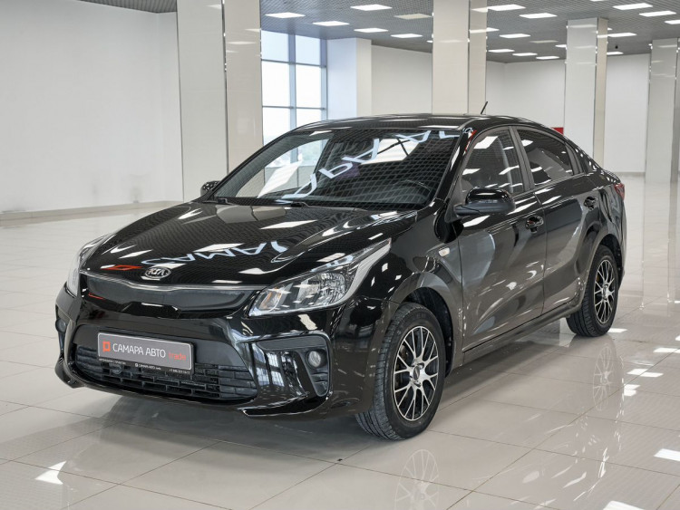 Kia Rio Comfort black,  1.4 MT (100 л.с.)